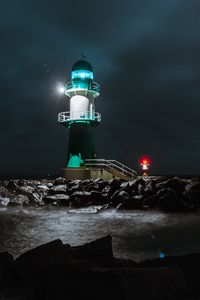 Preview wallpaper lighthouse, building, night, light, coast