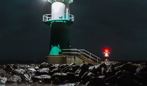 Preview wallpaper lighthouse, building, night, light, coast