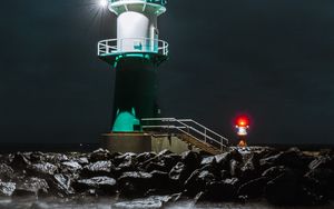 Preview wallpaper lighthouse, building, night, light, coast