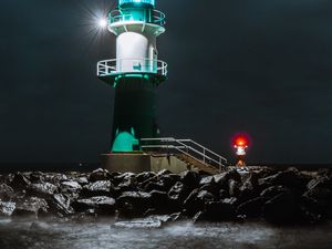Preview wallpaper lighthouse, building, night, light, coast