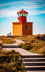 Preview wallpaper lighthouse, building, path, grass, sky