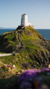 Preview wallpaper lighthouse, building, path, coast, sea