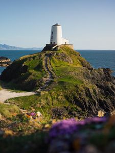 Preview wallpaper lighthouse, building, path, coast, sea
