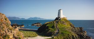 Preview wallpaper lighthouse, building, path, coast, sea