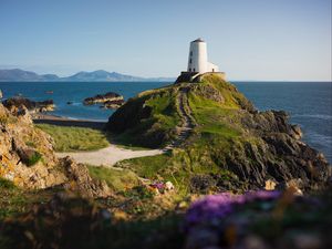 Preview wallpaper lighthouse, building, path, coast, sea