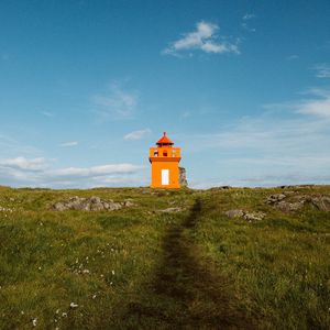 Preview wallpaper lighthouse, building, path, grass, stones