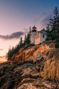 Preview wallpaper lighthouse, building, rock, shore