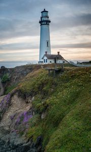 Preview wallpaper lighthouse, building, rocks, sea