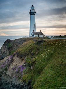 Preview wallpaper lighthouse, building, rocks, sea