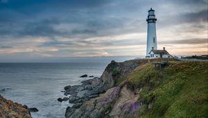 Preview wallpaper lighthouse, building, rocks, sea