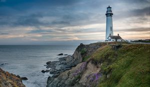 Preview wallpaper lighthouse, building, rocks, sea