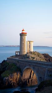 Preview wallpaper lighthouse, building, rocks, sea, horizon