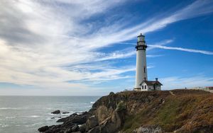 Preview wallpaper lighthouse, building, rocks, coast, sea