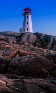 Preview wallpaper lighthouse, building, rocks, sea, coast