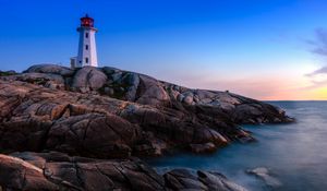 Preview wallpaper lighthouse, building, rocks, sea, coast