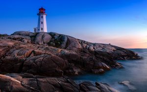 Preview wallpaper lighthouse, building, rocks, sea, coast