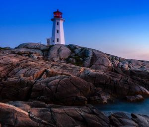 Preview wallpaper lighthouse, building, rocks, sea, coast