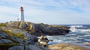 Preview wallpaper lighthouse, building, rocks, sea, sky