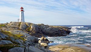 Preview wallpaper lighthouse, building, rocks, sea, sky