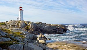 Preview wallpaper lighthouse, building, rocks, sea, sky