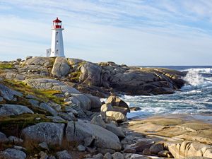 Preview wallpaper lighthouse, building, rocks, sea, sky