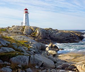 Preview wallpaper lighthouse, building, rocks, sea, sky