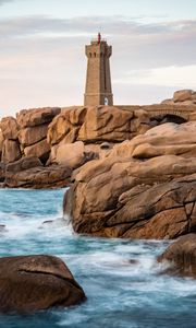 Preview wallpaper lighthouse, building, rocks, coast, stones, sea