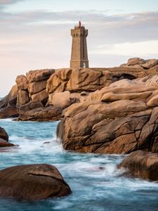 Preview wallpaper lighthouse, building, rocks, coast, stones, sea