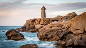 Preview wallpaper lighthouse, building, rocks, coast, stones, sea