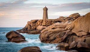 Preview wallpaper lighthouse, building, rocks, coast, stones, sea