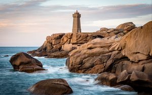 Preview wallpaper lighthouse, building, rocks, coast, stones, sea