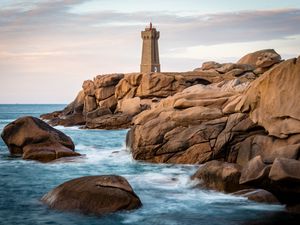 Preview wallpaper lighthouse, building, rocks, coast, stones, sea