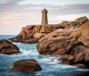 Preview wallpaper lighthouse, building, rocks, coast, stones, sea