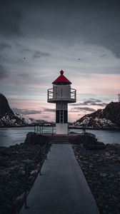 Preview wallpaper lighthouse, building, sea, road, rocks