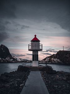 Preview wallpaper lighthouse, building, sea, road, rocks