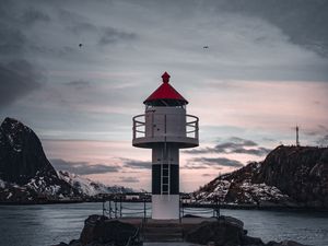 Preview wallpaper lighthouse, building, sea, road, rocks