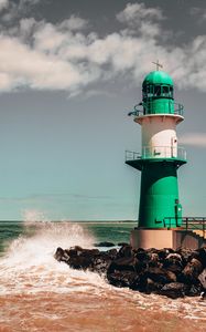 Preview wallpaper lighthouse, building, sea, rocks, surf