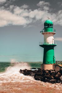 Preview wallpaper lighthouse, building, sea, rocks, surf