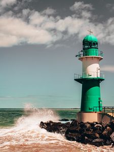 Preview wallpaper lighthouse, building, sea, rocks, surf