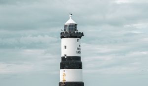 Preview wallpaper lighthouse, building, sea, coast