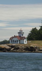 Preview wallpaper lighthouse, building, sea, coast, tree