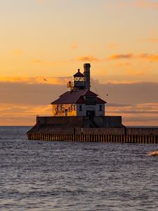 Preview wallpaper lighthouse, building, sea, sunset, waves