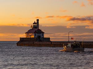 Preview wallpaper lighthouse, building, sea, sunset, waves