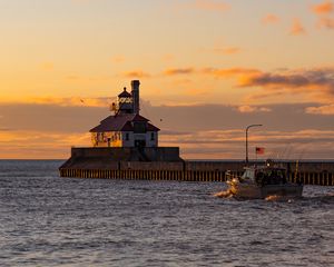 Preview wallpaper lighthouse, building, sea, sunset, waves