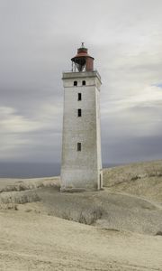 Preview wallpaper lighthouse, building, shore, sea, sky