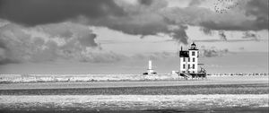 Preview wallpaper lighthouse, building, shore, sea, birds, sky, black and white
