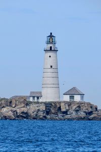 Preview wallpaper lighthouse, building, shore, sea, water