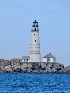 Preview wallpaper lighthouse, building, shore, sea, water