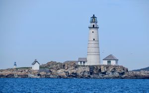 Preview wallpaper lighthouse, building, shore, sea, water