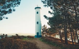 Preview wallpaper lighthouse, building, trees, hill, nature